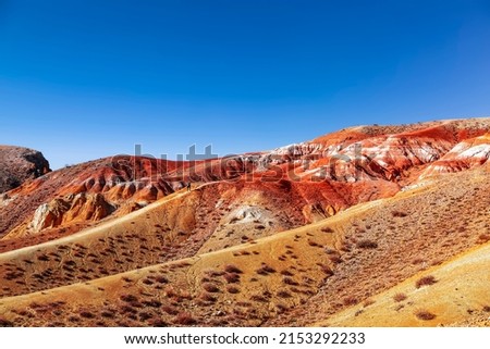 Multicolored mountains in the Altai Republic, reminiscent of the Martian landscape. Russia
