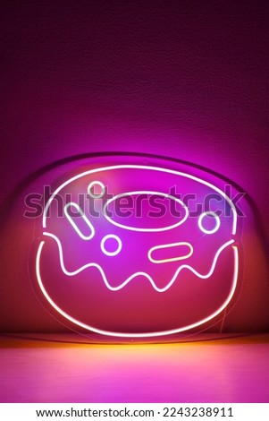 Multicolored neon sign donut. Trendy style. Neon sign. Custom neon.