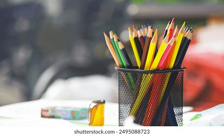 multicolored pencils. Colored pencils in a pencil case. concepts for concessions, school and office supplies. stationery for study, for work, art, drawing. office, school or institute. text space - Powered by Shutterstock