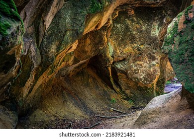 The multicolored rock formation of the Witches' Ravine located on the northern slopes of Skała Hill in Ciężkowice, Poland. An excellent tourist attraction. - Shutterstock ID 2183921481