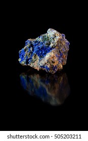 Multicolored rock with lazurite crystals on black background vertical view - Shutterstock ID 505203211