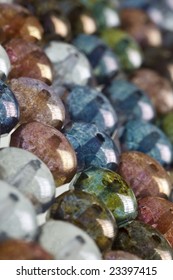 multicolored round beads in background pattern