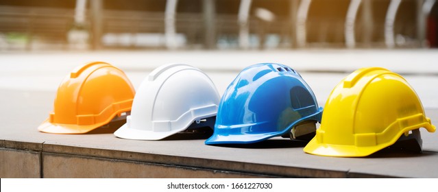 Multicolored Safety Construction Worker Hats. Teamwork of the construction team must have quality. Whether it is engineering, construction workers. Have a helmet to wear at work. For safety at work. - Shutterstock ID 1661227030
