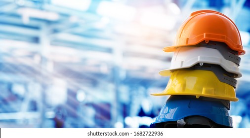 Multicolored Safety Construction Worker Hats. Teamwork Of The Construction Team Must Have Quality. Whether It Is Engineering, Construction Workers. Have A Helmet To Wear At Work. For Safety At Work.