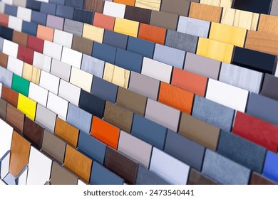 Multi-colored samples of composite materials for the ventilated facades in showroom. Construction