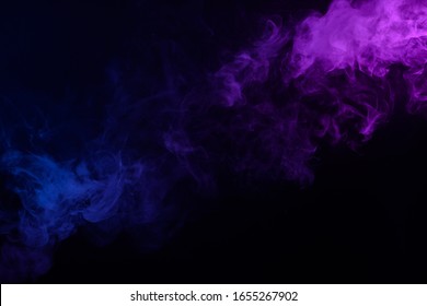 Multicolored Smoke Or Fog Blue And Purple On Black Background