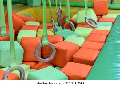 Multicolored Soft Cubes In The Children's Play Center. Fun On The Playground In The Indoor Park