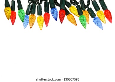 Multicolored String Of Christmas Lights Isolated On White Background