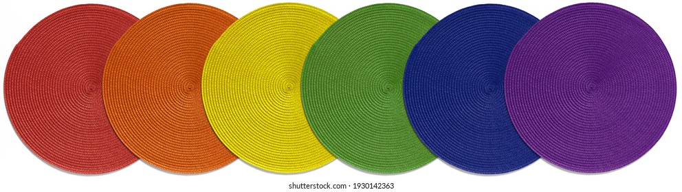 Multi-colored Texture Of Round Table Mat Of Different Colors Isolated On White Background. Colors Of Rainbow.