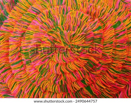 Multicolored thread strands texture background, top view of swirl yarn, loom background, cotton threads for embroidery