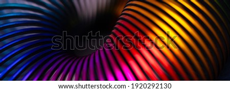 Multicolored toy spiral, panoramic image