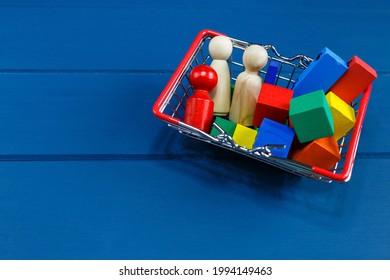 Multicolored Wooden Blocks, Cars, Train In Basket On Blue Background. Trendy Eco-friendly Puzzle Toys. Educational Toys For Kindergarten, Preschool. Back To School. Online Shopping For School.