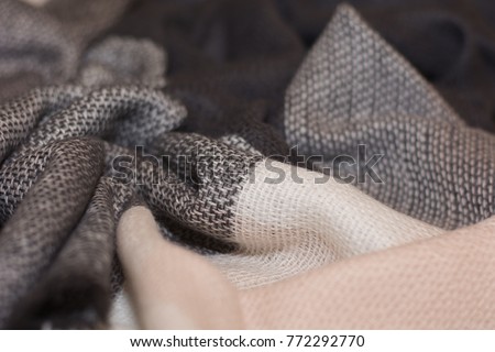 Multi-colored woolen scarf for women. Background. Texture.