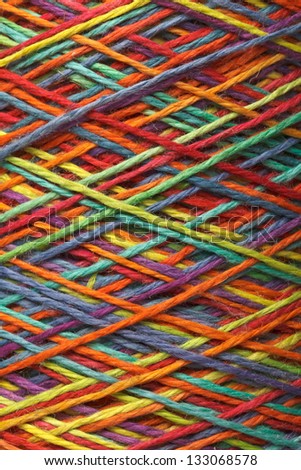 The multicolored yarn used for knitting clothes