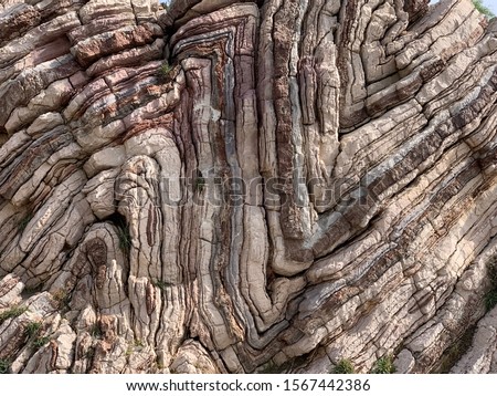 Multicoloured striped rocks in Agios Pavlos Crete, Greece