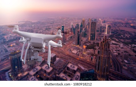 Multicopter Drone flying over the cityscape of Dubai, UAE