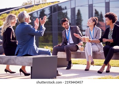 Multi-Cultural Business Team Sitting Outside Office For Coffee Break Have Informal Meeting - Shutterstock ID 2193443457