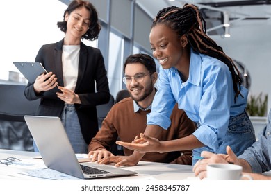 Multicultural businesspeople young entrepreneurs collaborating on new project - Powered by Shutterstock