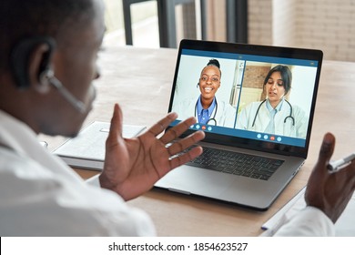 Multicultural doctors team conferencing in video call chat discussing health care learning online during web seminar. Group medical webinar training, healthcare elearning videoconference concept.
