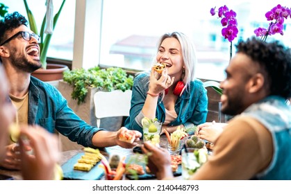 Multicultural Friends Eating Together At Luxury Pub Restaurant - Life Style Concept With Trendy Multiracial People Having Fun On Happy Hour At Bar Eatery - Vivid Filter With Focus On Central Woman