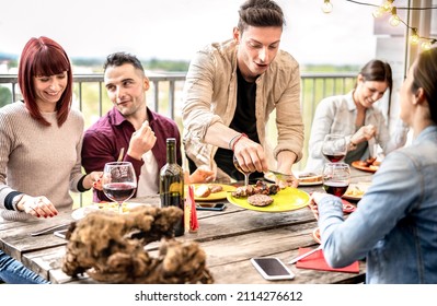 Multicultural Friends Eating Together At Roof Top Party On Happy Hour In Open Air Villa - Young People Drinking Wine At Restaurant Patio Terrace - Life Style Concept On Warm Bright Filter