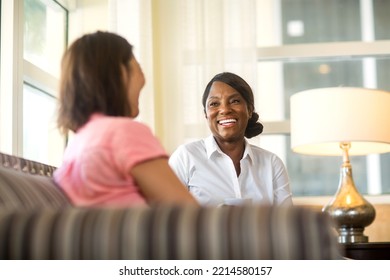 Multicultural friends hanging out and talking. - Powered by Shutterstock