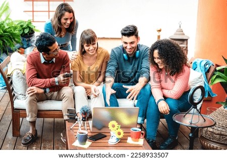 Multicultural friends startupper having fun on streaming platform - Content marketing concept with millenial men and women sharing live vlog feed on social media channel networks - Bright vivid filter