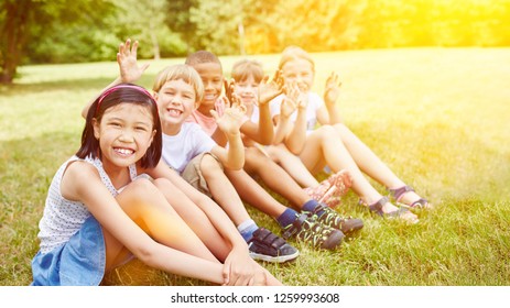 Multicultural Group Of Kids Smiling And Having Fun In Summer