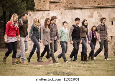 Multicultural Group Of People Walking Together