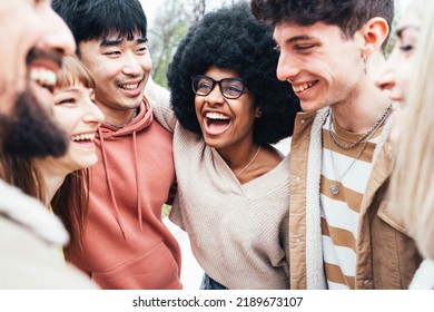 Multicultural Group Of Young People Having Fun Together Outside - Happy Students Socializing In College Campus - Friendship Lifestyle Concept With Guys And Girls Laughing Walking On City Street