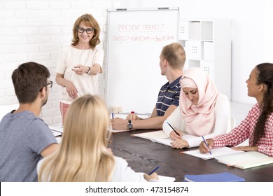 Multicultural Language Class And Positive Mature Teacher