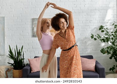 A multicultural lesbian couple dances together in their modern apartment, radiating joy and love. - Powered by Shutterstock