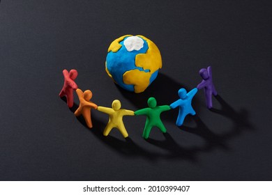 Multicultural People Around Earth. Justice And No Racism Concept. Gender And Racial Equality. DIY. Children's Crafts From Colored Plasticine. Group Of People Around The World.