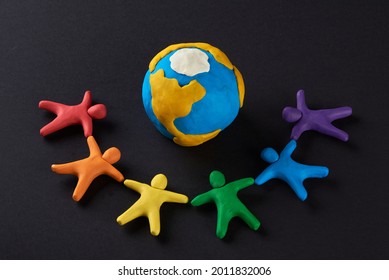 Multicultural People Around Earth. Justice And No Racism Concept. Gender And Racial Equality. DIY. Children's Crafts From Colored Plasticine. Group Of People Around The World.