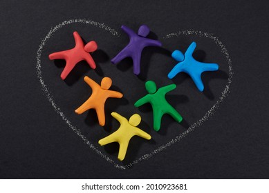 Multicultural People Together. Justice And No Racism Concept. Gender And Racial Equality. DIY. Children's Crafts From Colored Plasticine. Group Of People In Shape Heart.