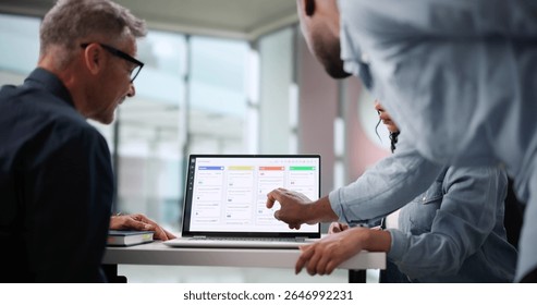 Multicultural Project Team Collaborates Using Various Management Techniques And Software.