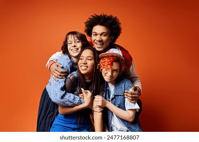 Multicultural young friends, including a nonbinary individual, dressed stylishly, standing together and posing for a picture.