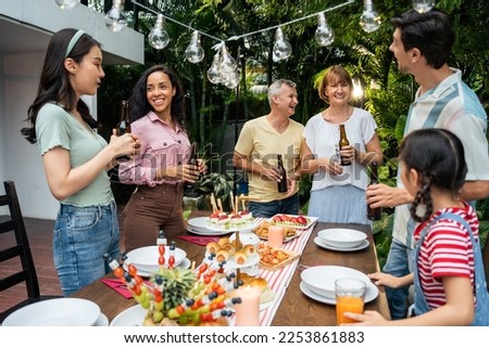 Similar – Freunde essen Kuchen und haben Spaß auf der Party.