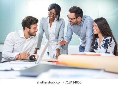 Multiethnic Diverse Group Of Creative Team, Casual Business People In Strategic Meeting Or Project Brainstorm In Modern Office.