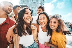 Multiethnic Friends Having Fun Walking On City Street - Group Of Young People Enjoying Summer Vacation Together - Friendship Concept With Guys And Girls Hanging Outside On A Sunny Day 