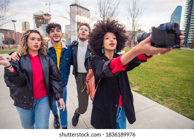 Multiethnic Friends  Walking Outdoor Taking Selfie - Group Of Diverse Friends Having Fun Outdoor Doing Live On Social Media - Friendship, Vlogger, Communication Concept