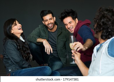 Multiethnic Group Of Friends Hanging Out On Saturday Night. Partying On Saturday Night