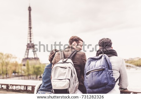 Multi-ethnic Group Of Friends Having Fun In Paris Along Seine