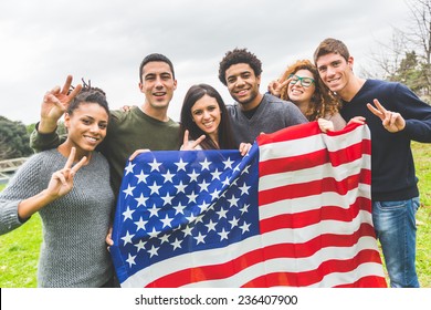 Multiethnic Group Of Friends With United States Flag