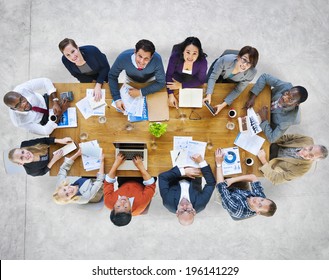 Multi-Ethnic Group of People in a Meeting Looking Up