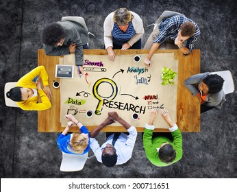 Multi-Ethnic Group Of People In A Meeting And Research Concept