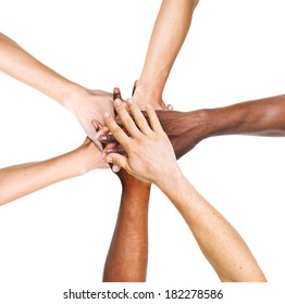 Multi-Ethnic Group Of People Stacking Their Hands Together