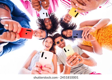 Multiethnic group of young happy friends bonding outside, having fun on summertime vacation - Multicultural cheerful people with summer clothes enjoying summer holidays - Powered by Shutterstock