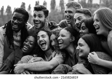 Multiethnic Happy Group Of People Having Fun Outdoor - Focus On Center African Girl - Black And White Editing