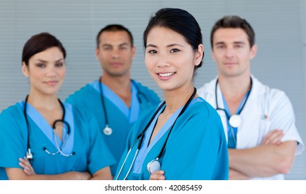 Multi-ethnic medical team smiling at the camera
